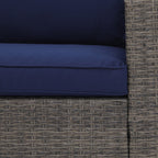 Salon de jardin en rotin pour 4 personnes avec coussins gris et table en verre trempé