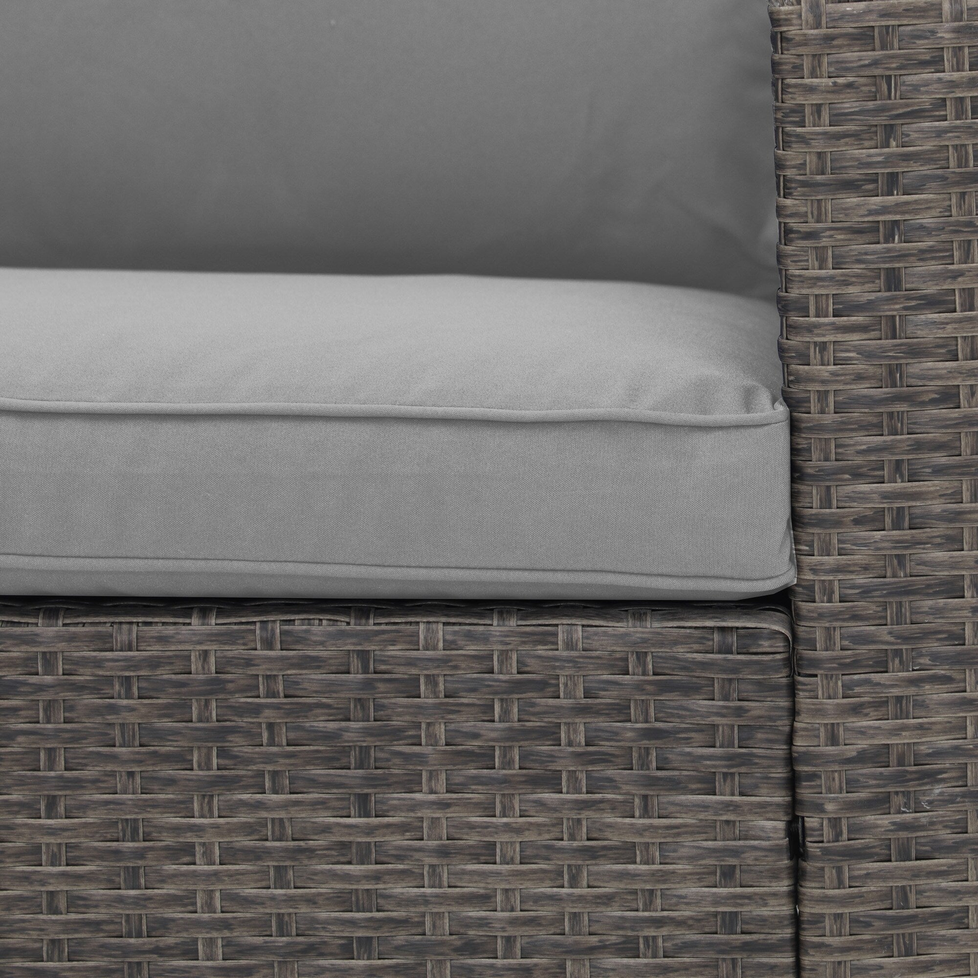 Salon de jardin en rotin pour 4 personnes avec coussins gris et table en verre trempé