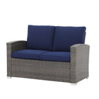 Salon de jardin en rotin pour 4 personnes avec coussins gris et table en verre trempé