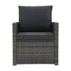 Salon de jardin en rotin pour 4 personnes avec coussins gris et table en verre trempé