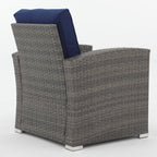 Salon de jardin en rotin pour 4 personnes avec coussins gris et table en verre trempé