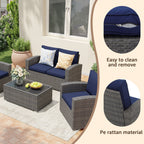 Salon de jardin en rotin pour 4 personnes avec coussins gris et table en verre trempé