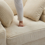 42.12 Canapé rembourré en velours côtelé + pouf