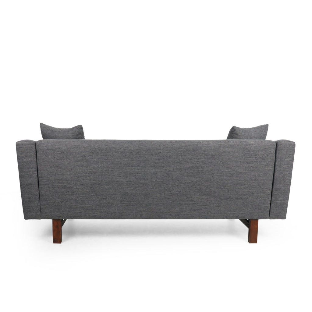 Canapé 3 places capitonné avec pieds en bois et coussins pour le salon