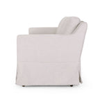 Canapé 3 places en tissu rayé avec accoudoirs encastrés et jupe pour salon