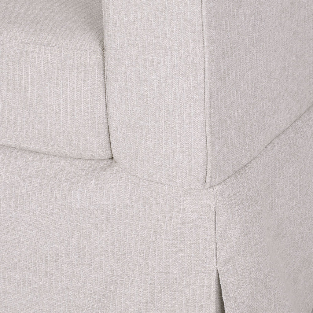 Canapé 3 places en tissu rayé avec accoudoirs encastrés et jupe pour salon