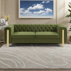 Canapé 3 places en velours 83,75 $ avec surpiqûres en losanges capitonnées, touches dorées et pieds en fer