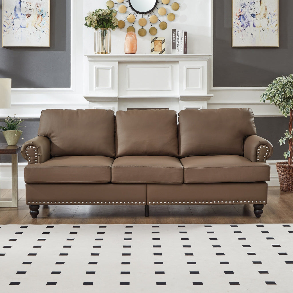 Canapé 3 places en cuir véritable aspect peau de vache avec garniture cloutée, revêtement en similicuir résistant.