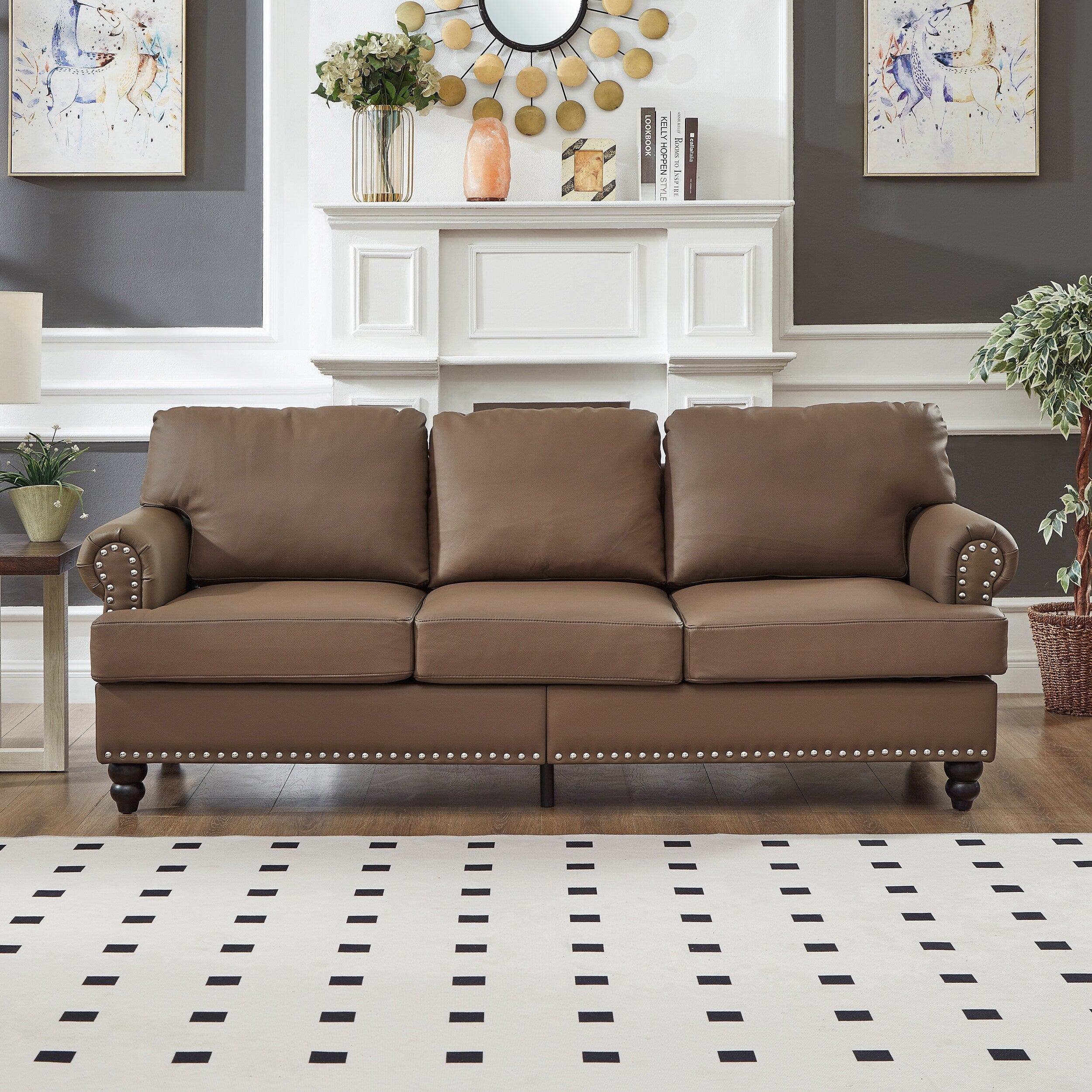 Canapé 3 places en cuir véritable aspect peau de vache avec garniture cloutée, revêtement en similicuir résistant.