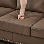 Canapé 3 places en cuir véritable aspect peau de vache avec garniture cloutée, revêtement en similicuir résistant.