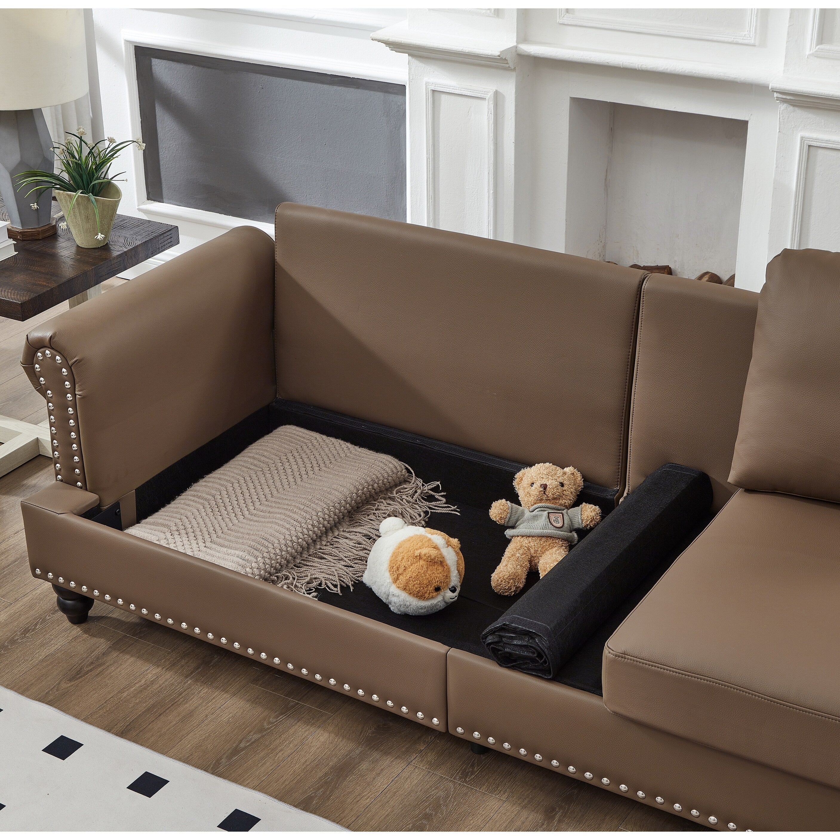 Canapé 3 places en cuir véritable aspect peau de vache avec garniture cloutée, revêtement en similicuir résistant.