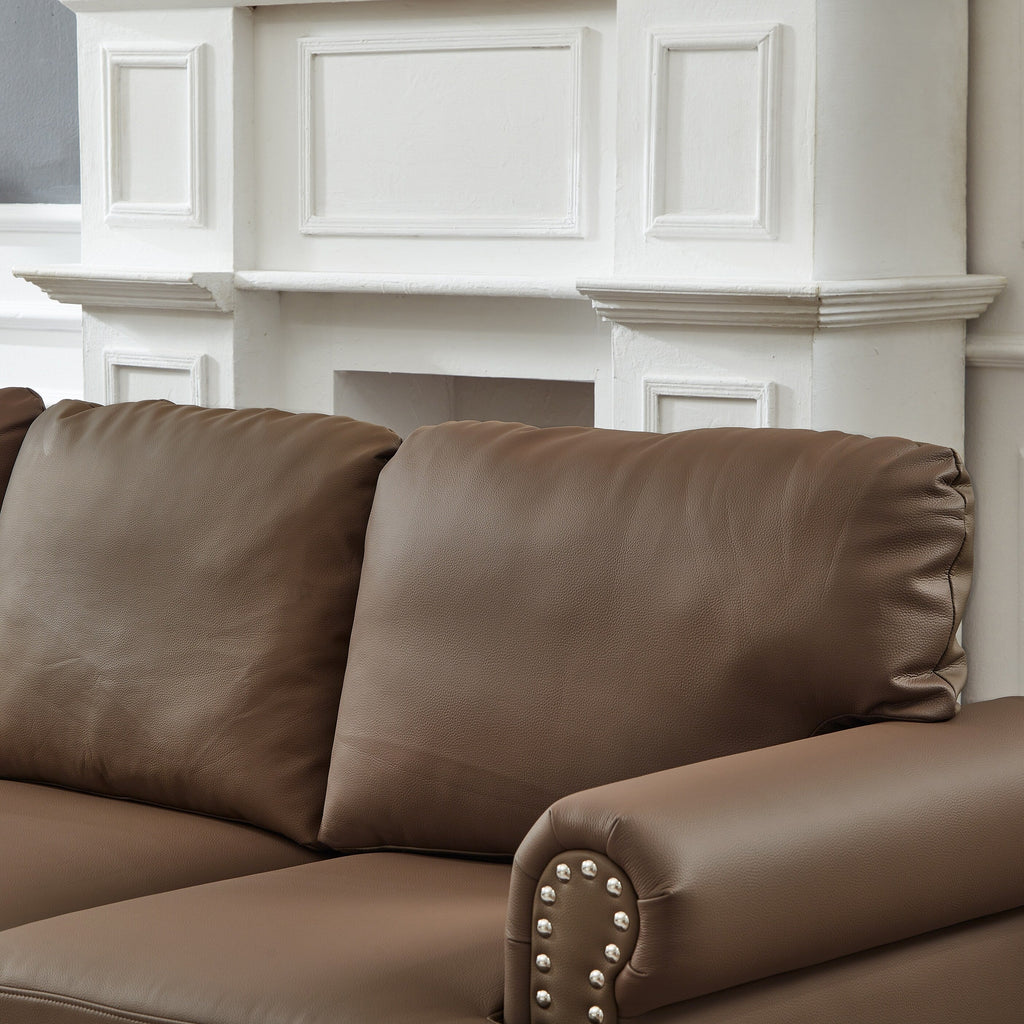 Canapé 3 places en cuir véritable aspect peau de vache avec garniture cloutée, revêtement en similicuir résistant.