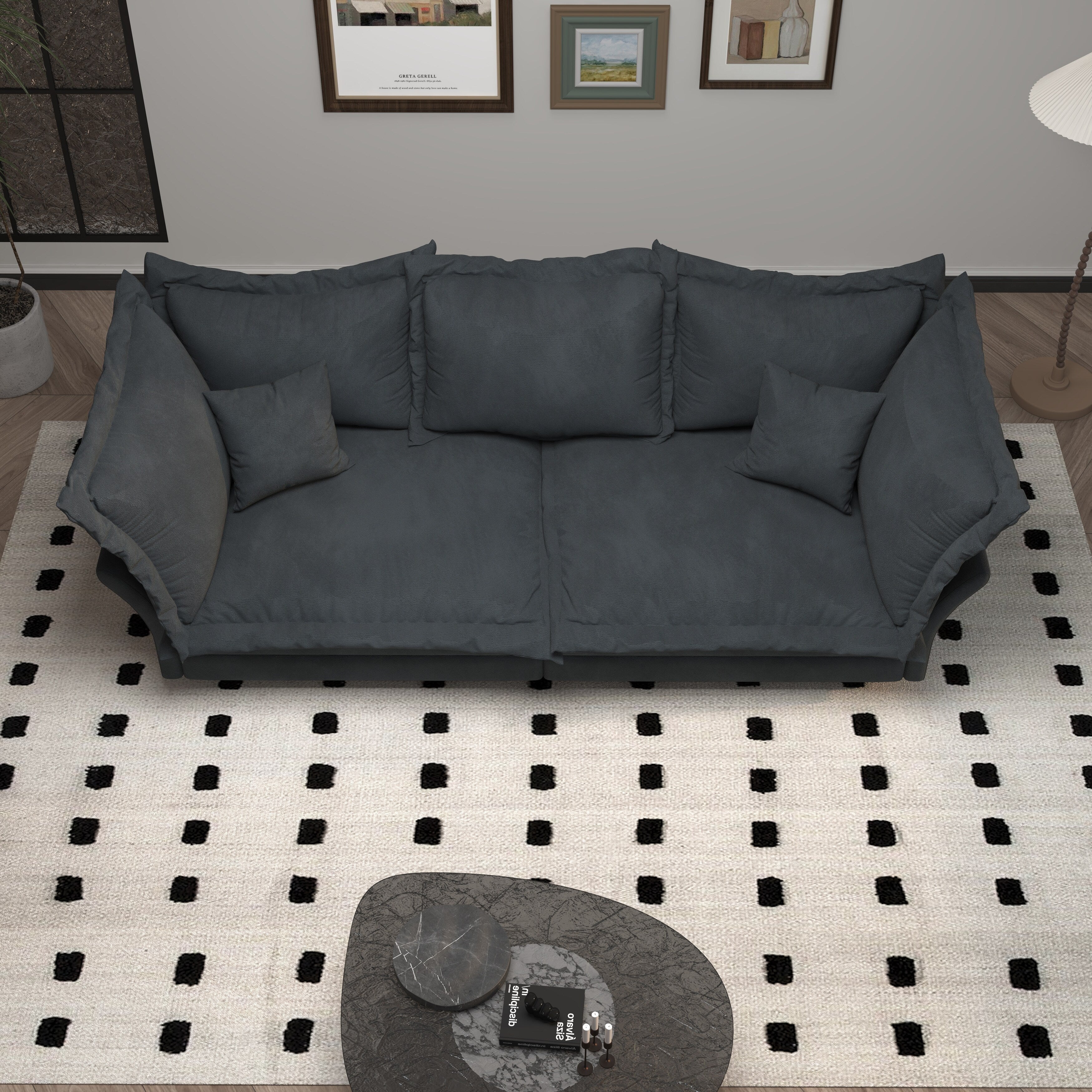 Canapés modernes à assise profonde avec plusieurs grands coussins moelleux