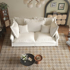 Canapés modernes à assise profonde avec plusieurs grands coussins moelleux