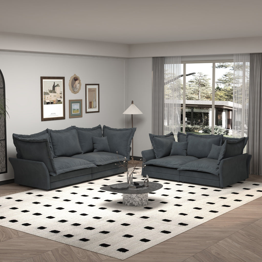 Canapés modernes à assise profonde avec plusieurs grands coussins moelleux