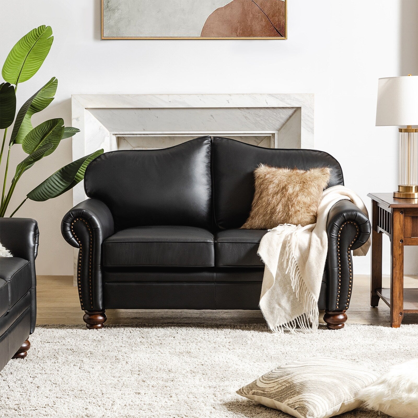 Canapé transitionnel Angel en cuir véritable avec dossier capitonné par HULALA HOME