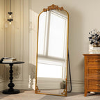 Miroir arqué pleine longueur avec motif floral baroque