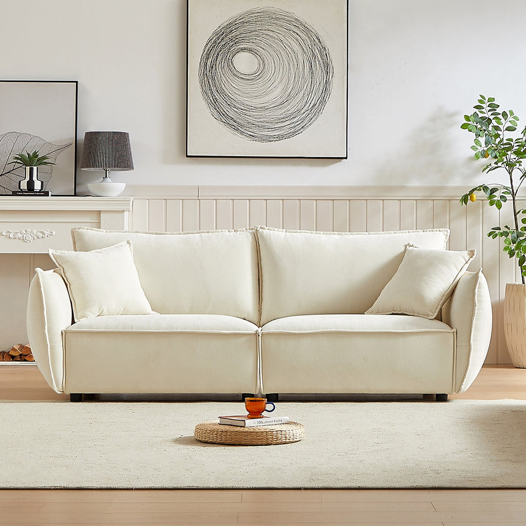 Canapé 3 places en chenille beige avec coussins supplémentaires