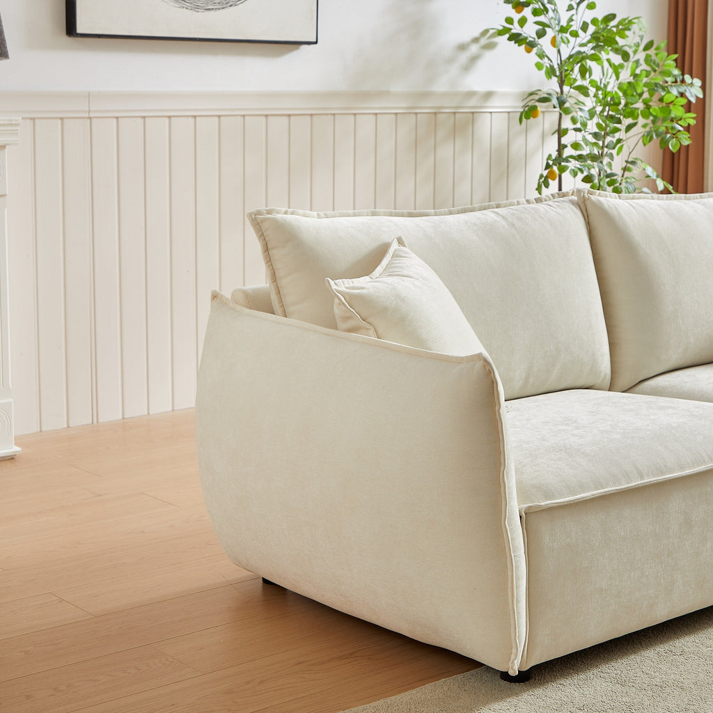 Canapé 3 places en chenille beige avec coussins supplémentaires