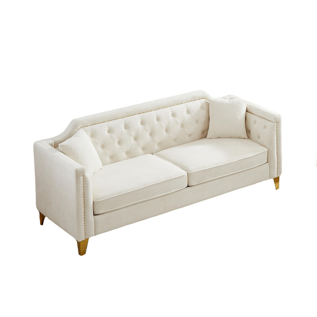 Canapé 3 places capitonné en chenille beige avec décoration cloutée en cuivre