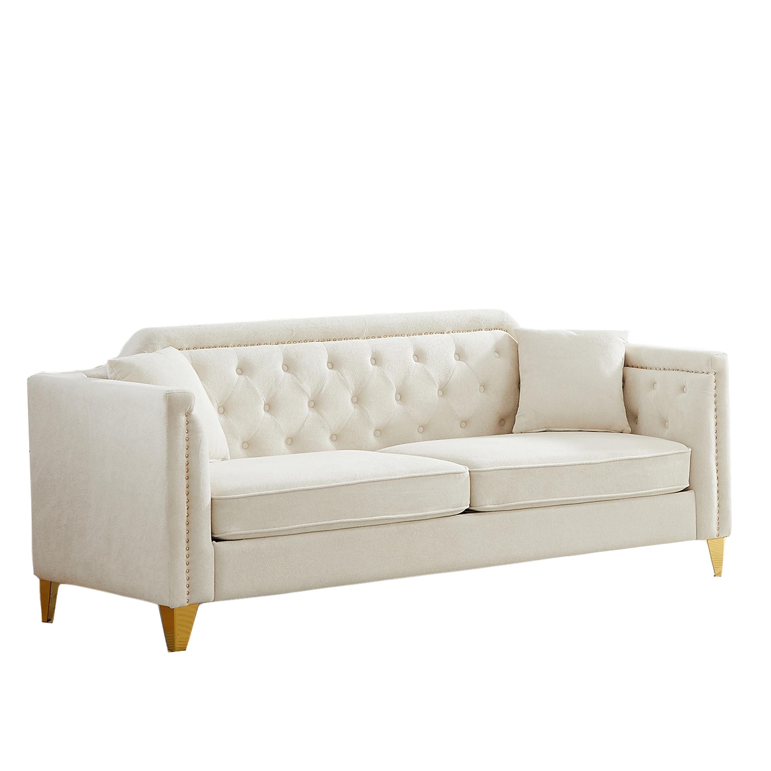 Canapé 3 places capitonné en chenille beige avec décoration cloutée en cuivre