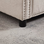 Canapé causeuse en chenille beige avec poche et clous décoratifs