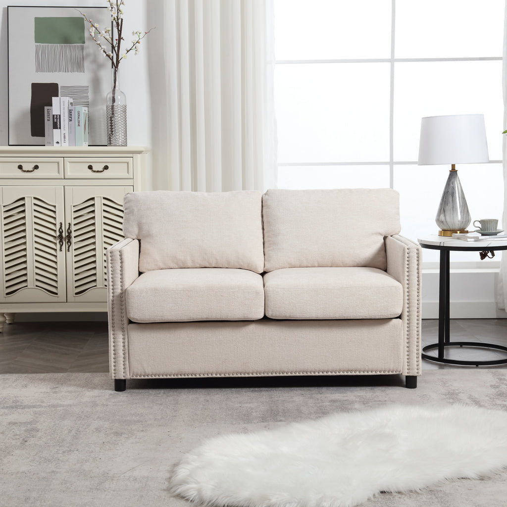 Canapé causeuse en chenille beige avec poche et clous décoratifs
