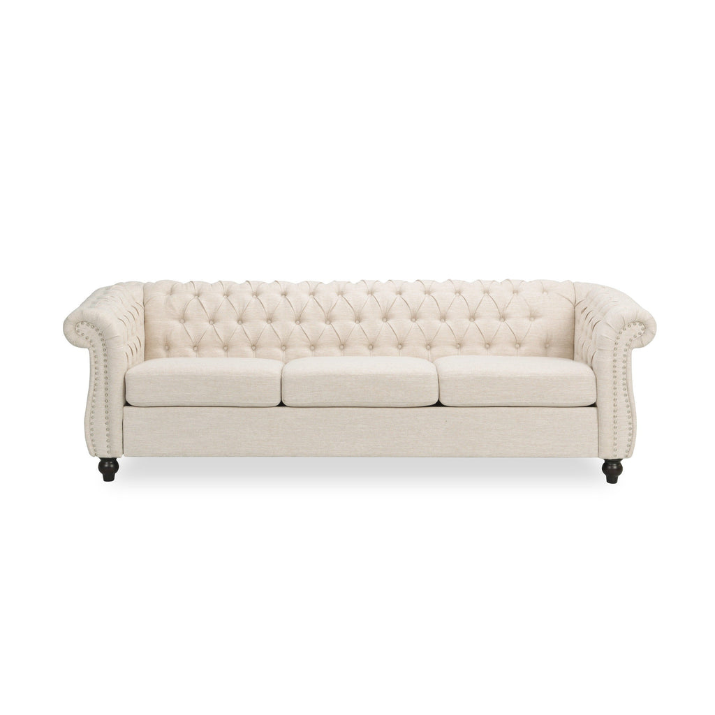 Canapé 3 places Chesterfield beige 84,75, capitonné, avec clous et pieds en bois