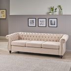 Canapé 3 places Chesterfield beige capitonné avec boutons et clous