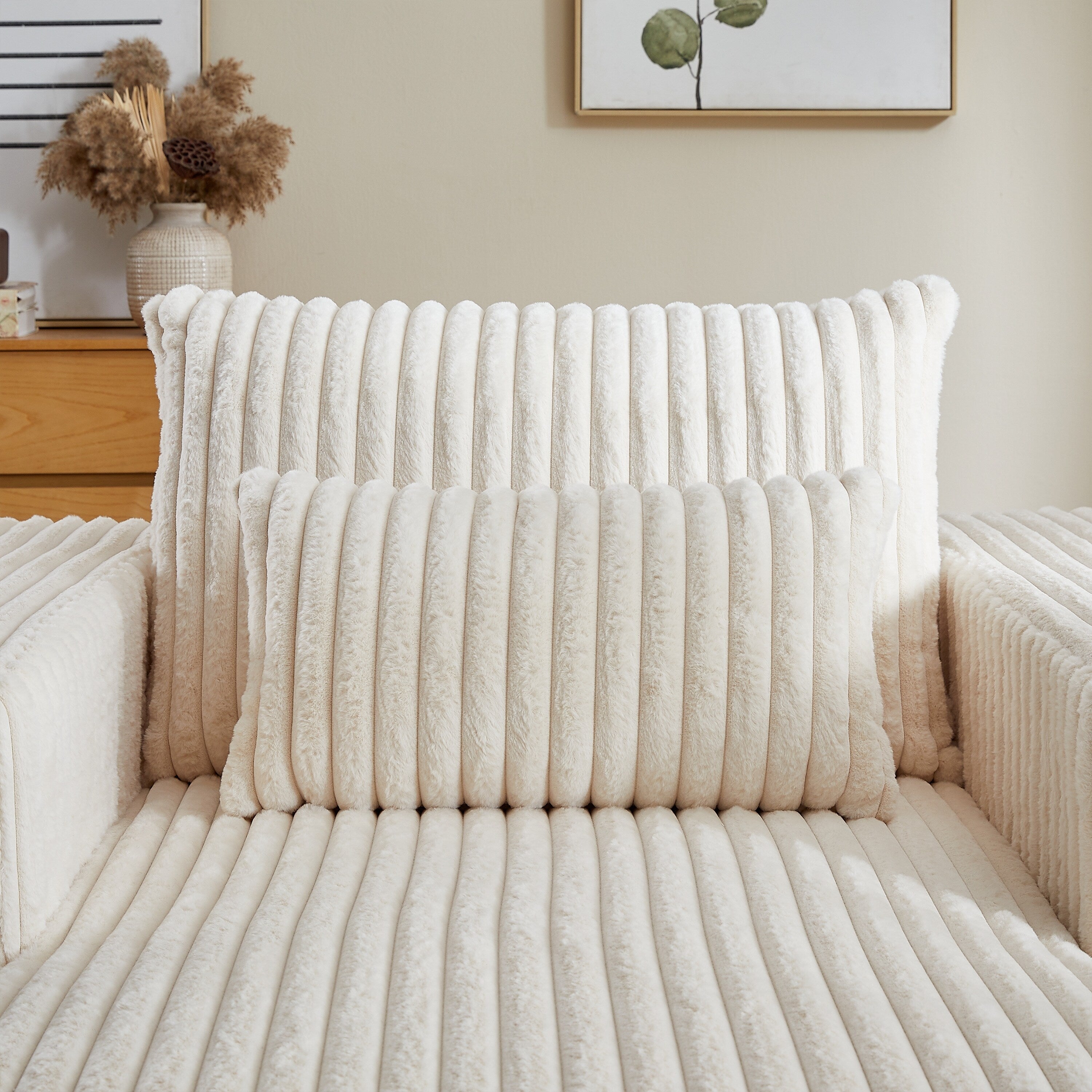 Fauteuil de salon en velours côtelé beige avec 2 coussins