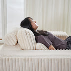 Fauteuil de salon en velours côtelé beige avec 2 coussins