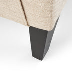 Fauteuil inclinable moderne en tissu beige avec repose-pieds, clous décoratifs et pieds en bouleau