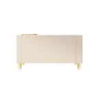 Canapé causeuse en velours beige moderne avec touches dorées et coussins moelleux pour le salon