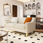 Canapé causeuse en velours beige moderne avec touches dorées et coussins moelleux pour le salon