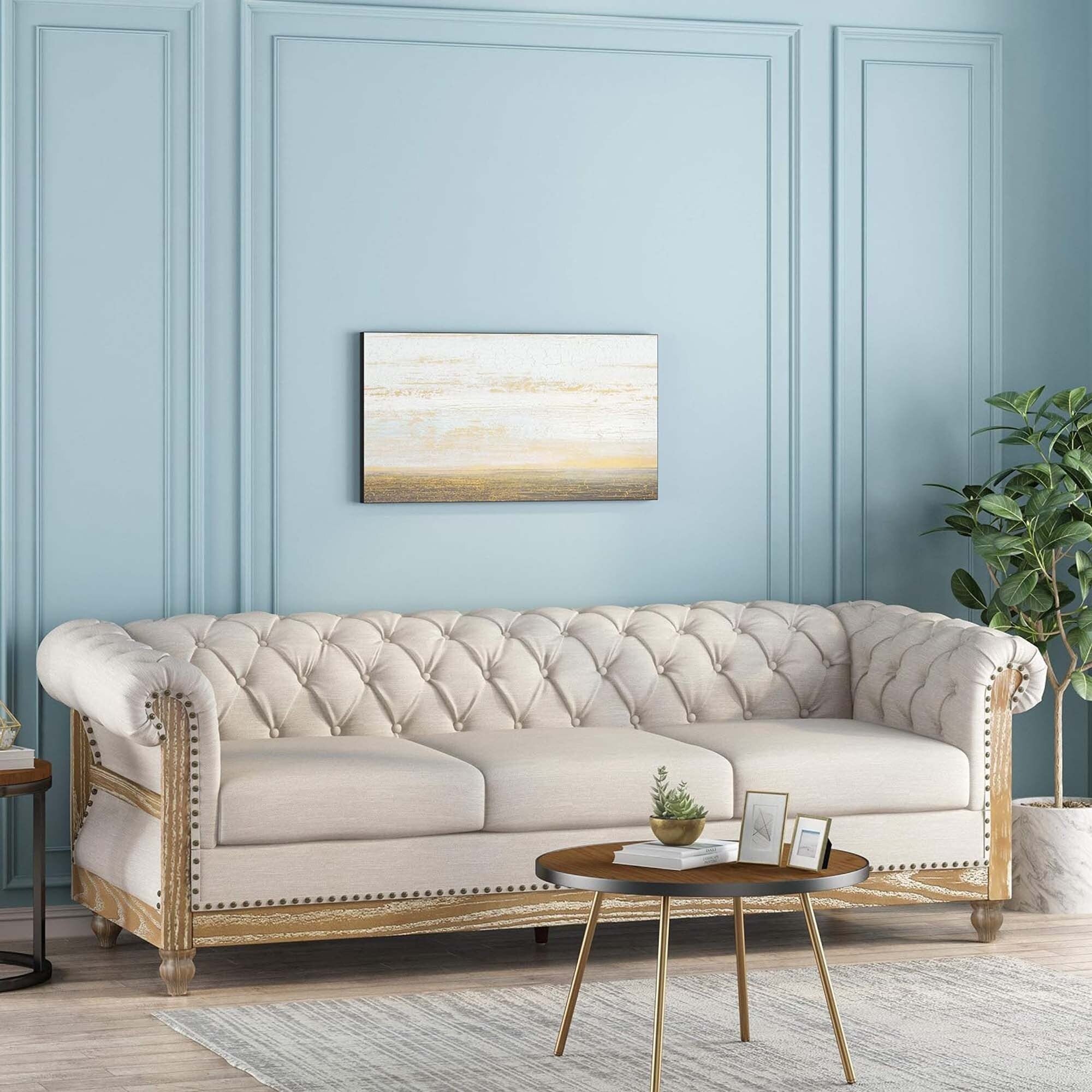 Canapé Chesterfield 3 places beige rétro 85,5 avec boutons capitonnés et pieds en bois pour le salon