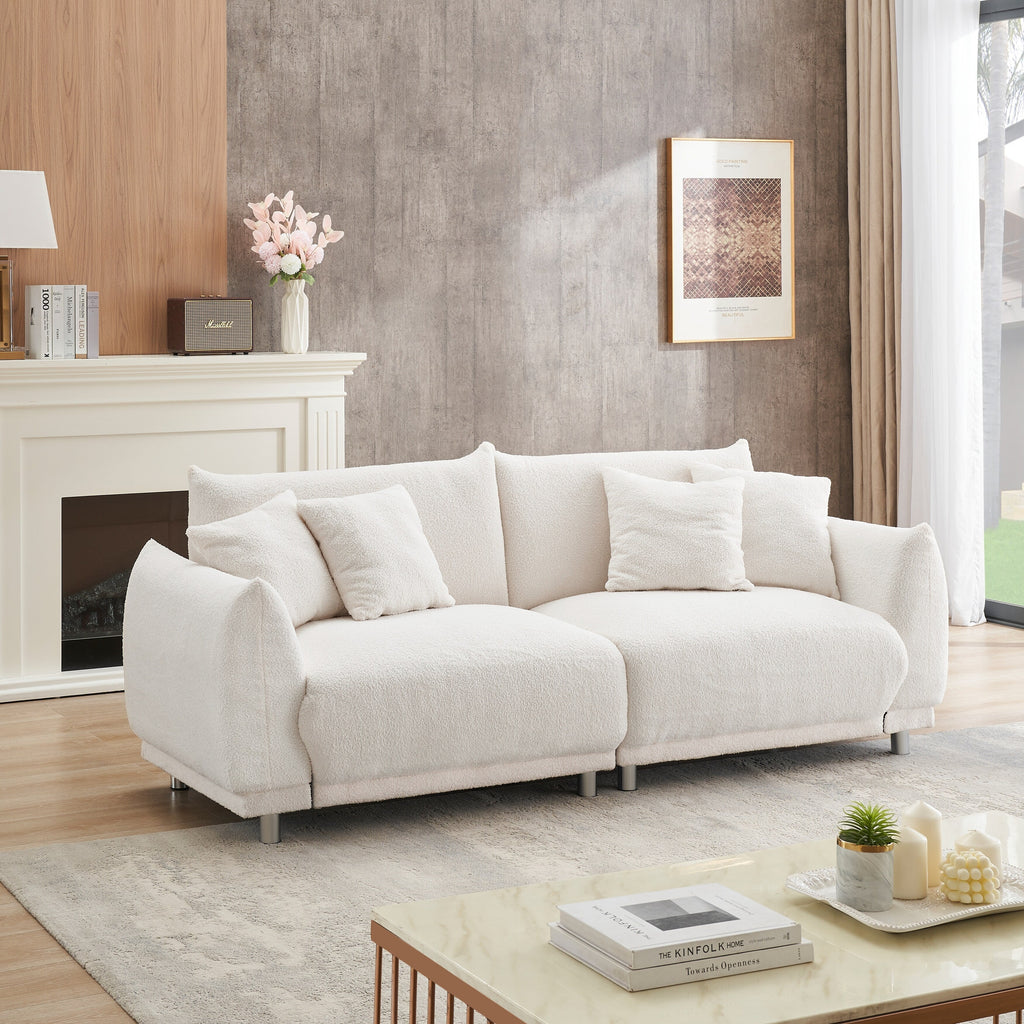 Canapé causeuse en laine beige avec quatre coussins