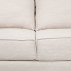 Canapé 3 places beige rembourré avec coussins et pieds en bois