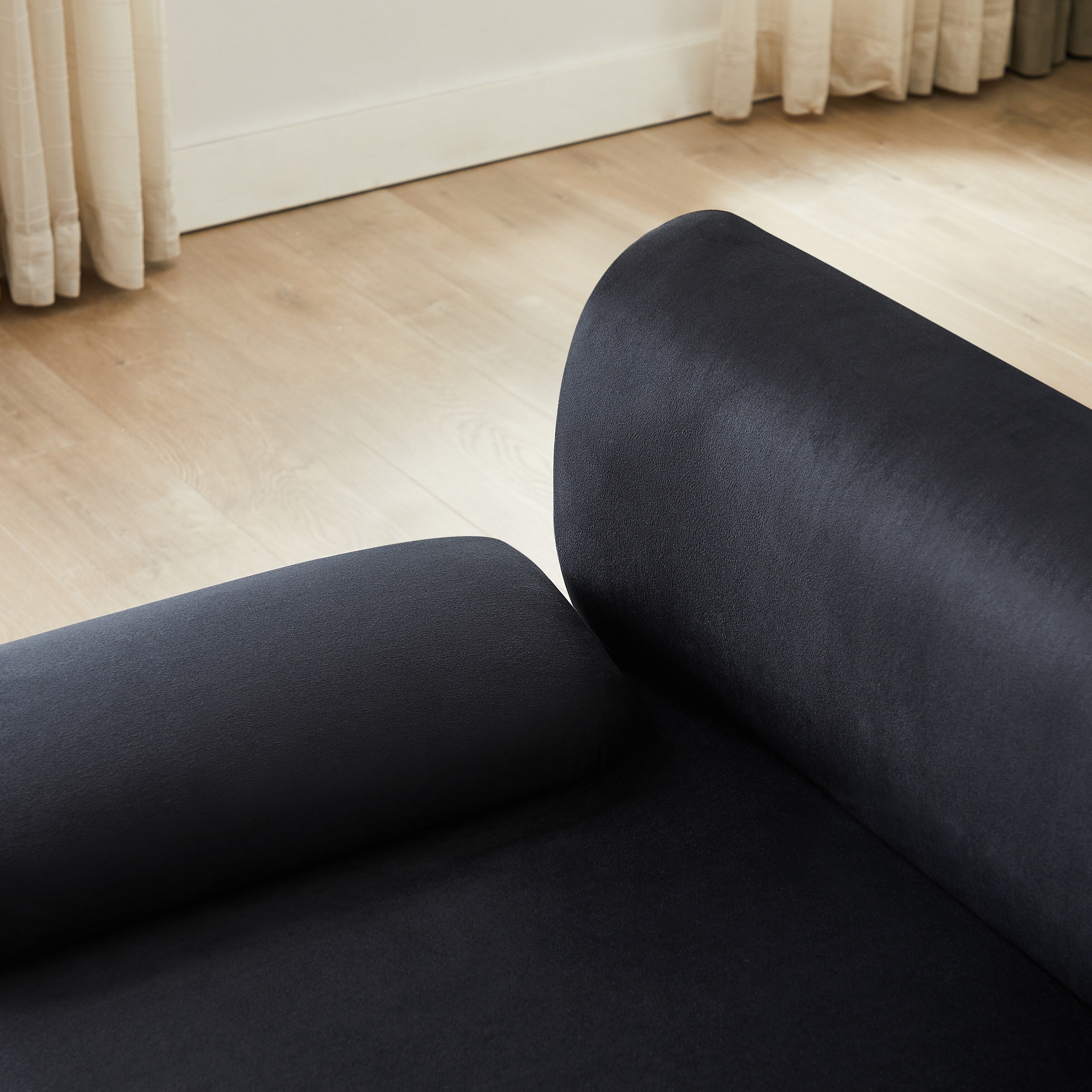 Canapé convertible en L en tissu noir 105 avec pouf