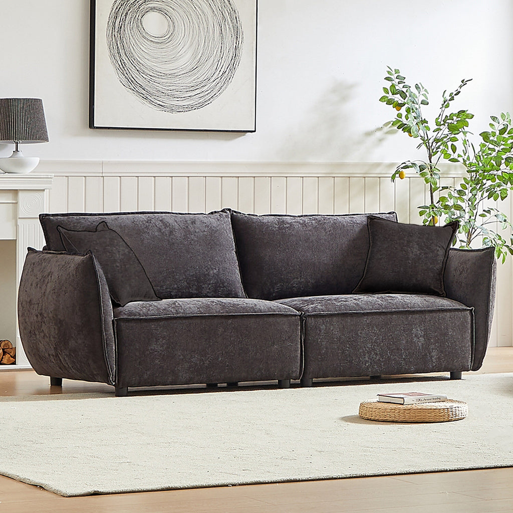 Canapé 3 places en chenille noire avec coussins supplémentaires