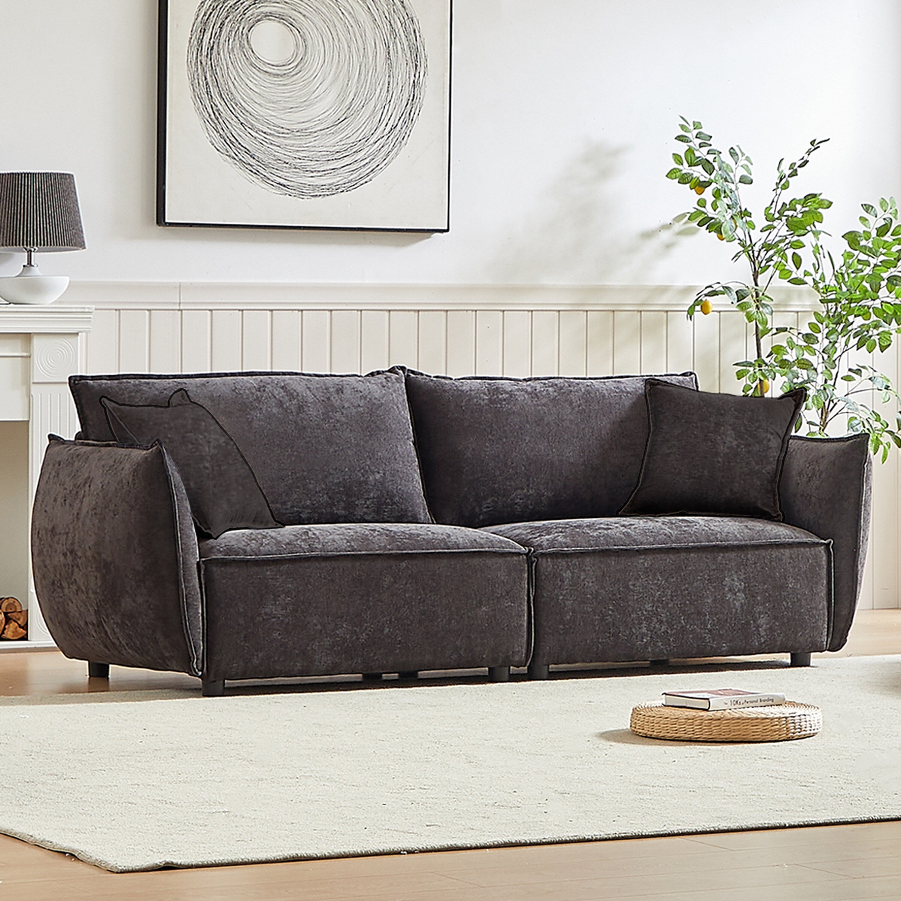 Canapé 3 places en chenille noire avec coussins supplémentaires