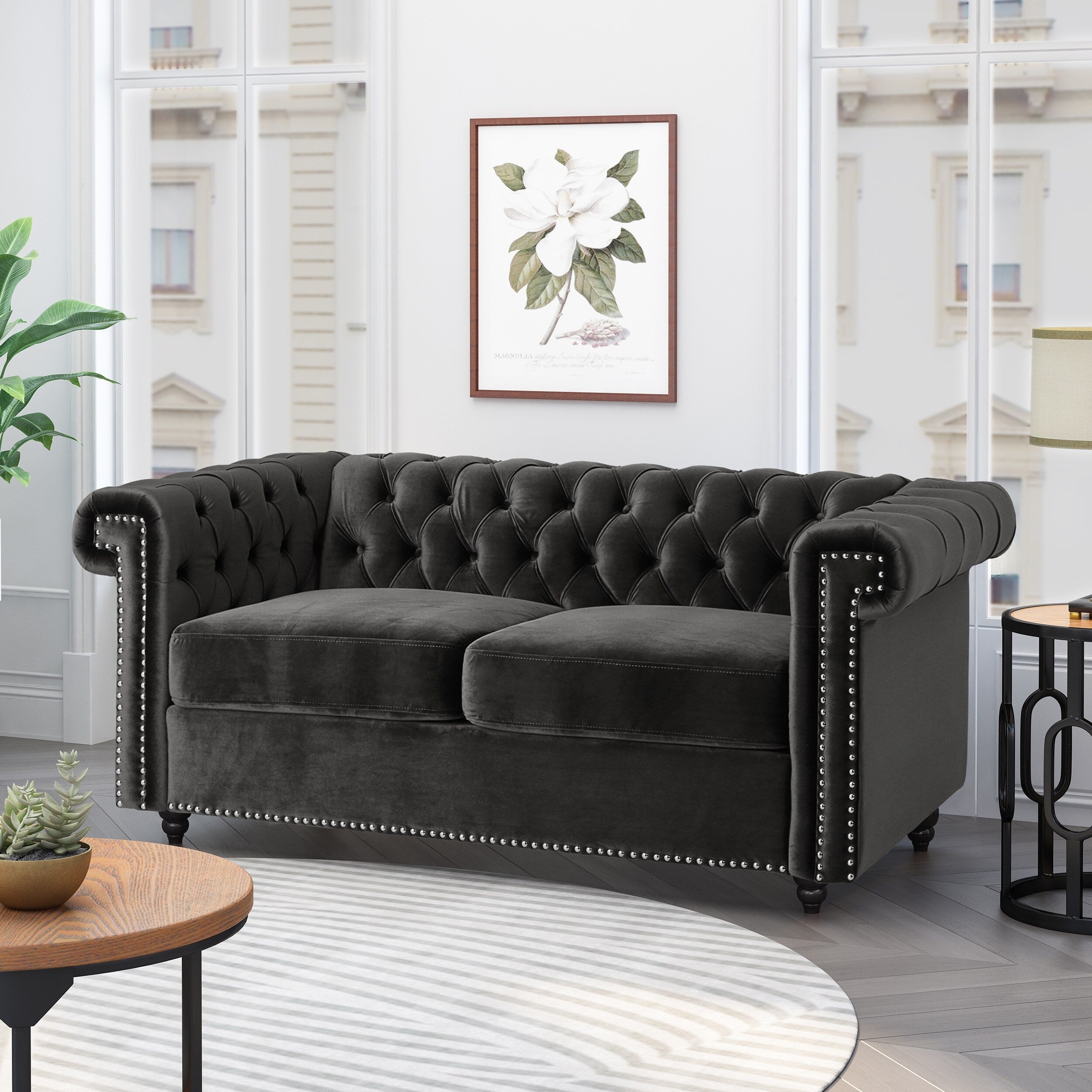 Canapé Chesterfield noir capitonné à boutons avec têtes de clous