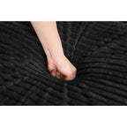 Canapé simple en velours côtelé noir avec pouf et accoudoir de rangement