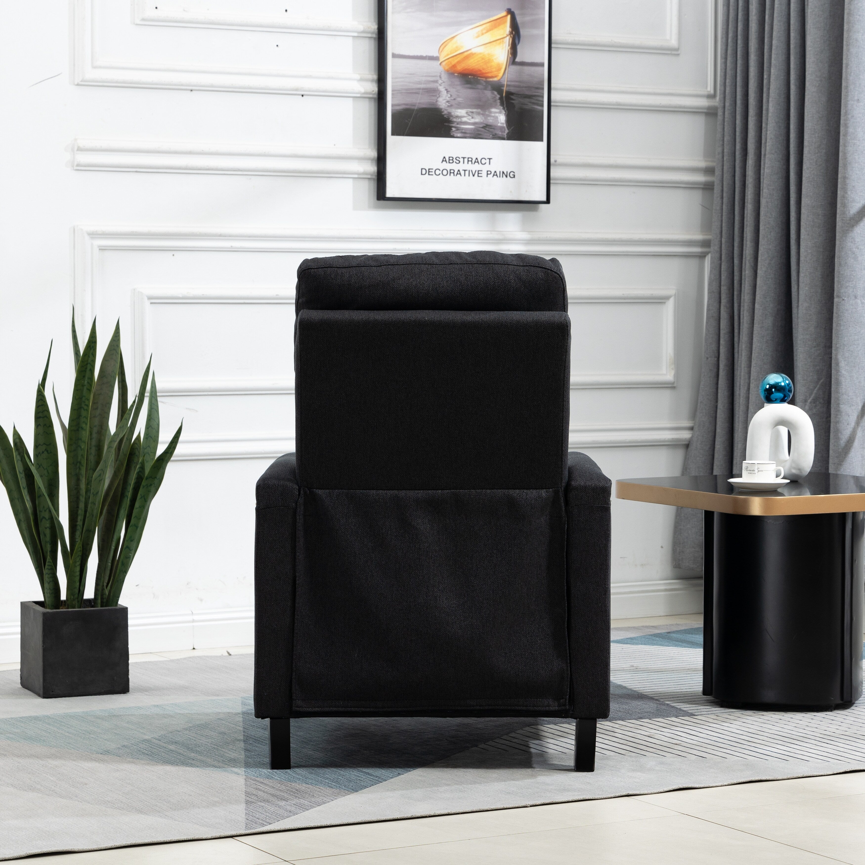 Fauteuil inclinable manuel moderne en velours noir avec coussins et décoration cloutée