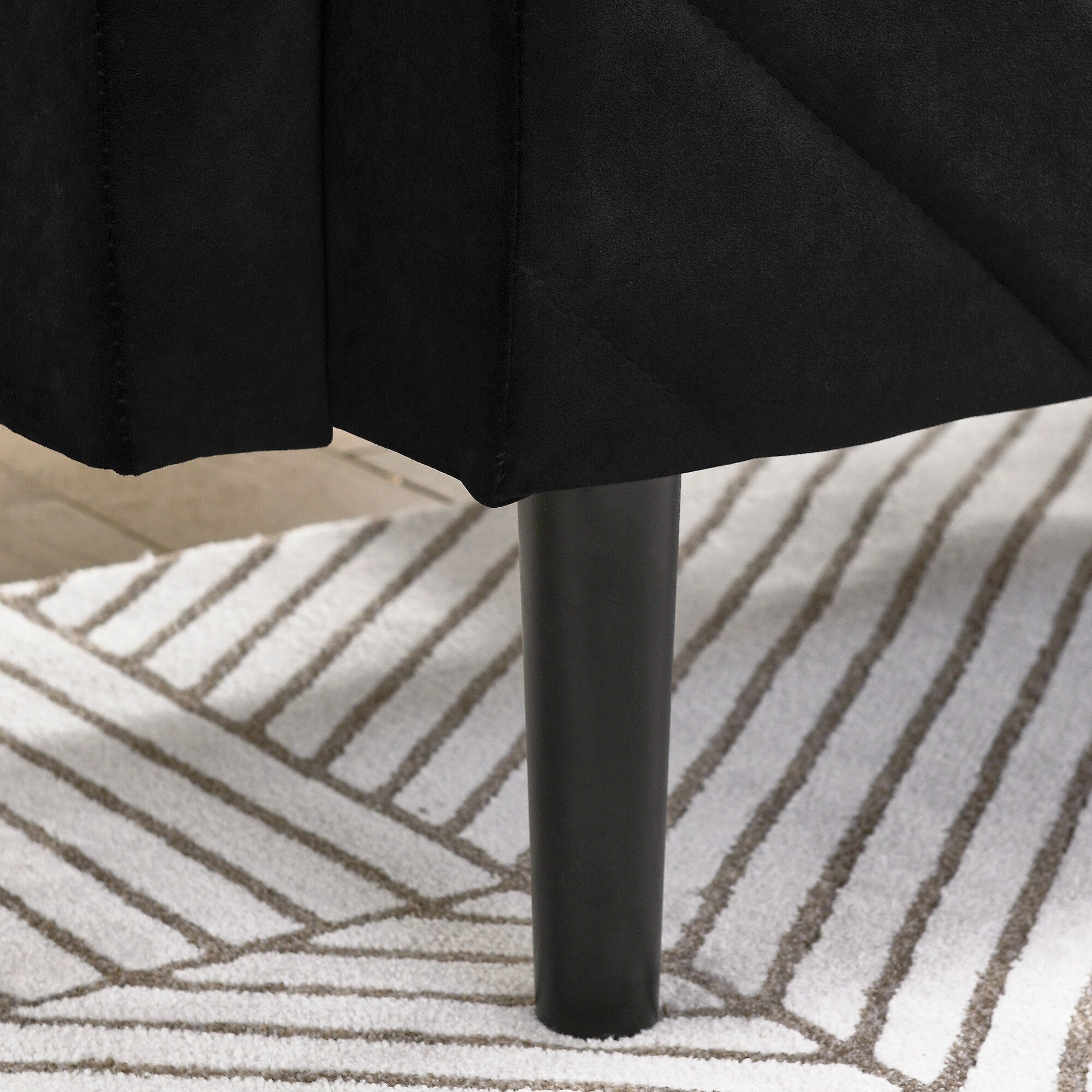 Canapé-lit futon convertible capitonné en velours noir