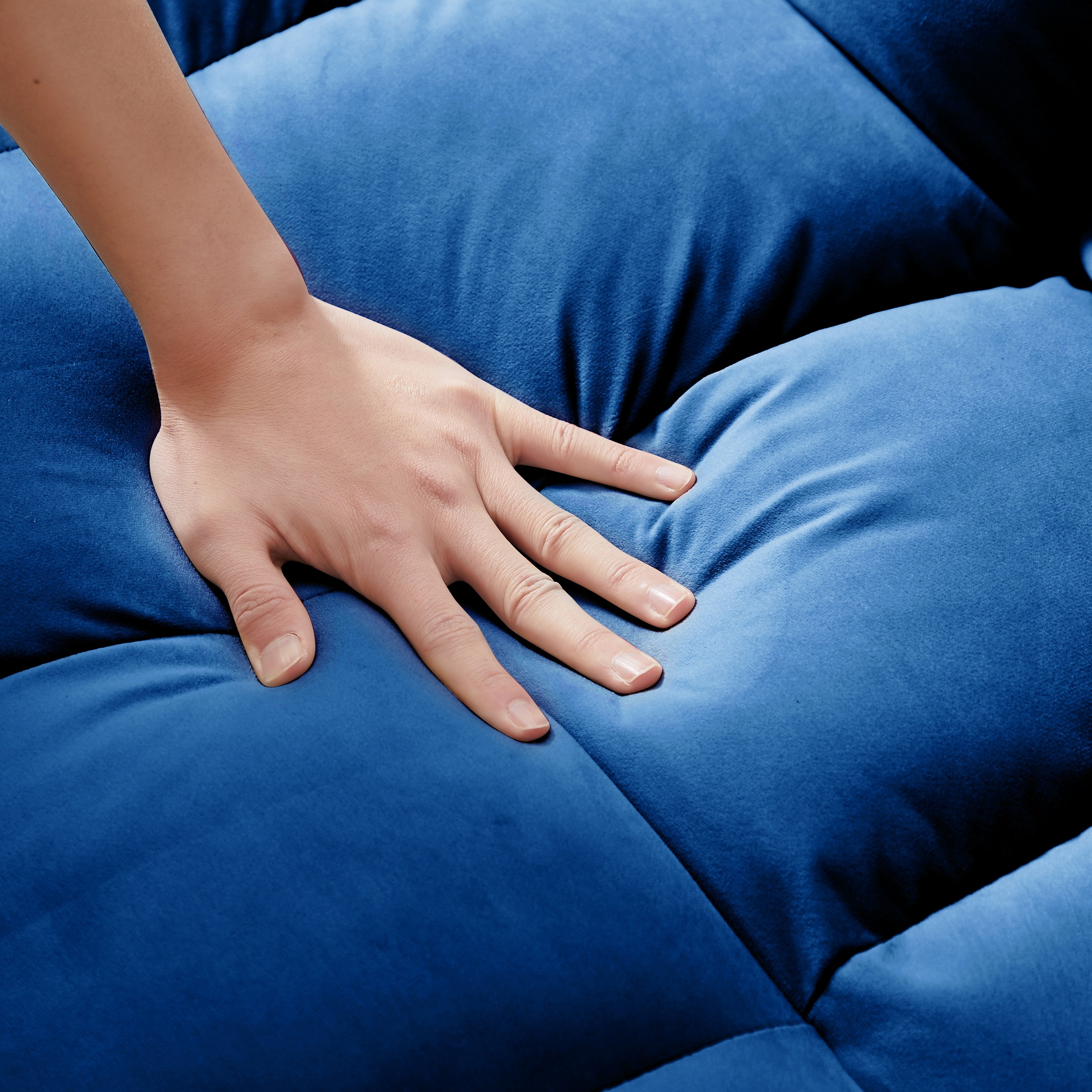 Canapé-lit bleu avec sac de rangement