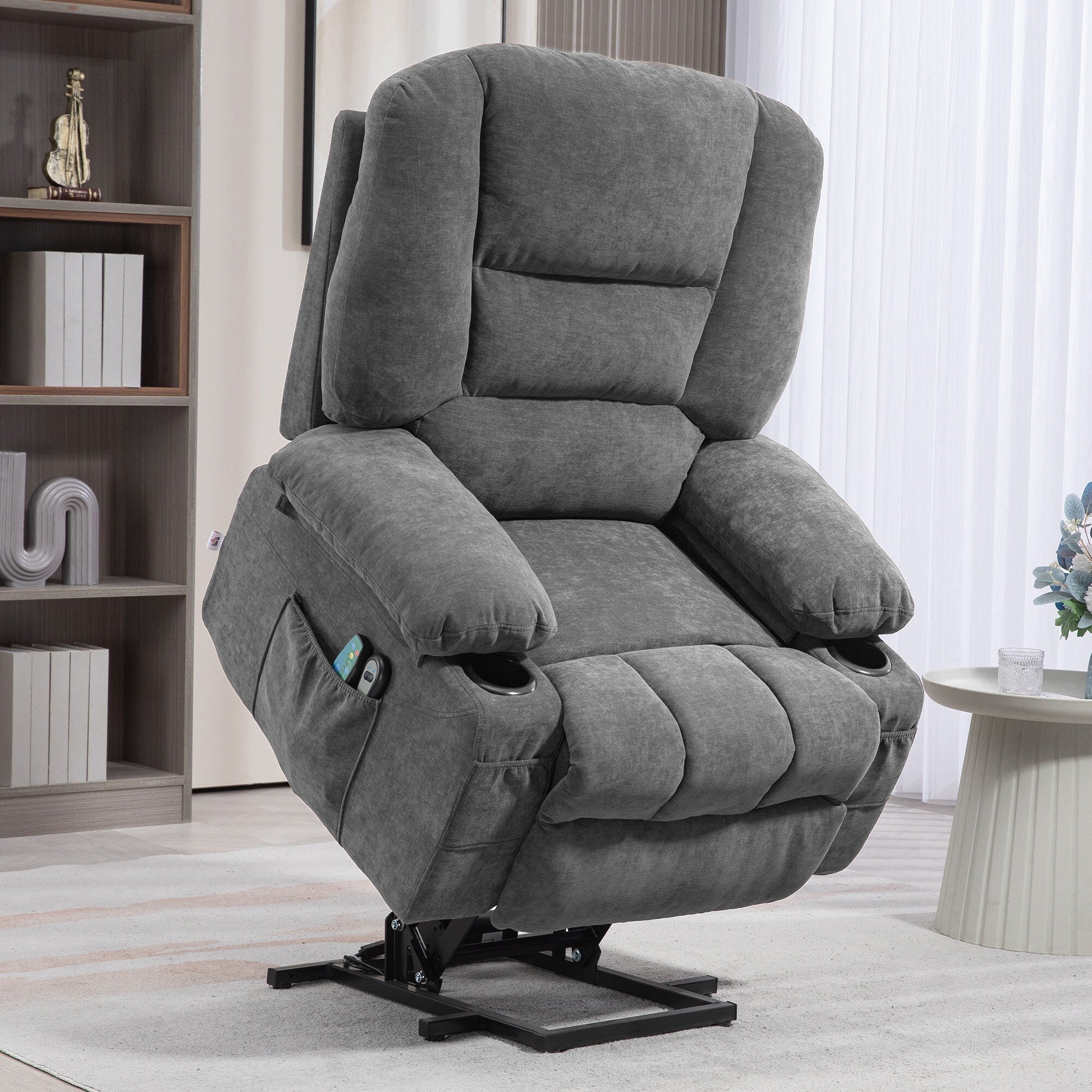 Fauteuil inclinable électrique marron avec massage par vibration, chauffage, positions réglables, télécommande et poches de rangement.