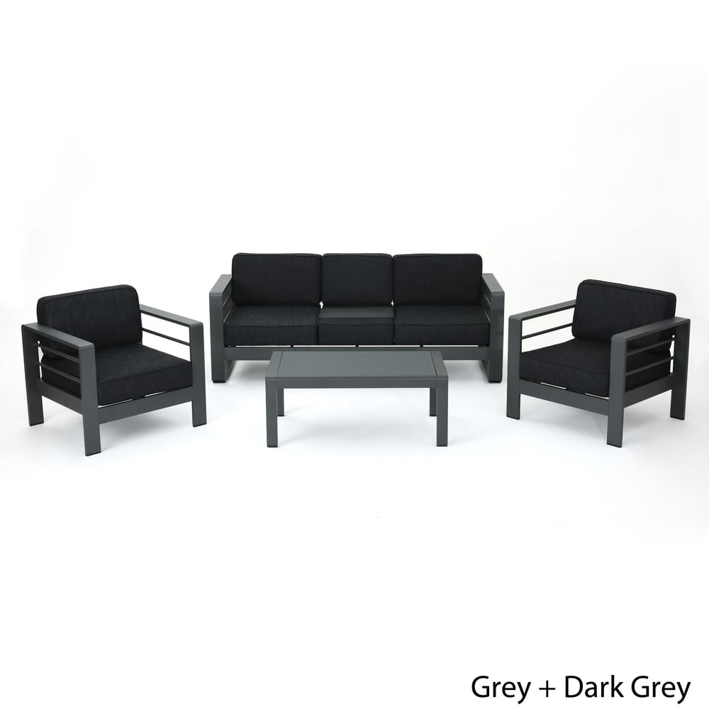 Ensemble de salon de jardin Cape Coral en aluminium et verre trempé, 4 pièces, avec coussins, par Christopher Knight Home