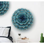 Décoration murale en métal bleu sarcelle avec motif floral Carson Carrington Mjugg
