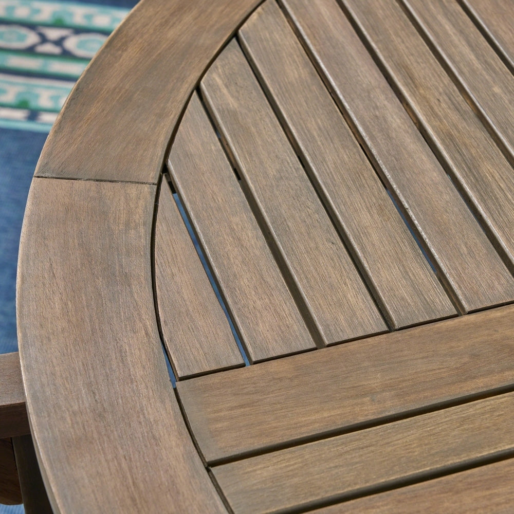 Ensemble de salle à manger rond Casa Outdoor 4 places 47 en acacia avec pieds sculptés par Christopher Knight Home