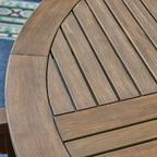 Ensemble de salle à manger rond Casa Outdoor 4 places 47 en acacia avec pieds sculptés par Christopher Knight Home